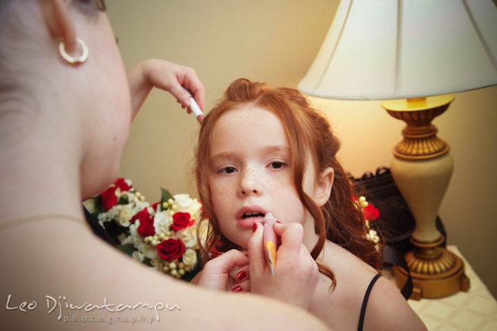 Bridesmaid helping each other out putting lip gloss. Prospect Bay Country Club Grasonville MD Wedding Photographer by Leo Dj Photography