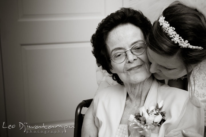 Bride touching mother's cheek with her cheek. Prospect Bay Country Club Grasonville MD Wedding Photographer by Leo Dj Photography