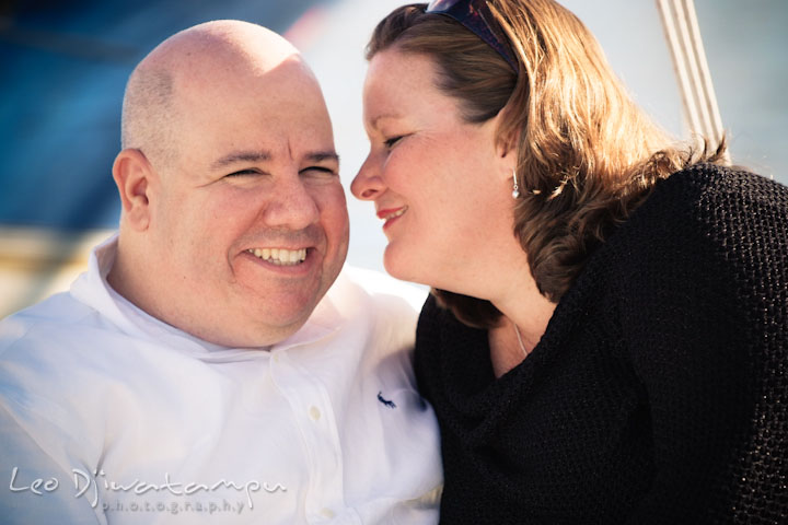 Engaged lady teasing her fiancé. Annapolis Downtown USNA Pre-wedding Engagement Photographer, Leo Dj Photography