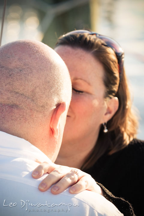 Engaged lady kissed her fiancé, and showing her engagement ring. Annapolis Downtown USNA Pre-wedding Engagement Photographer, Leo Dj Photography