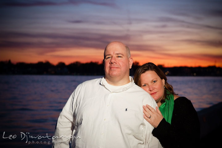 Engaged lady resting her head on fiancé's shoulder. Annapolis Downtown USNA Pre-wedding Engagement Photographer, Leo Dj Photography
