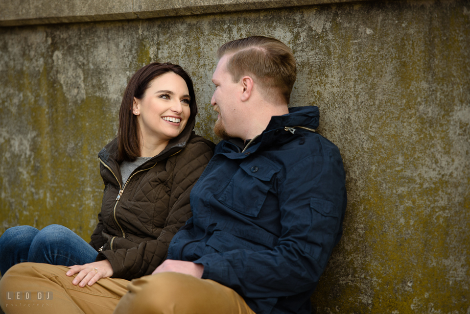 Jonas Green Park Annapolis Maryland engaged girl smiling and chatting with fiancé photo by Leo Dj Photography.