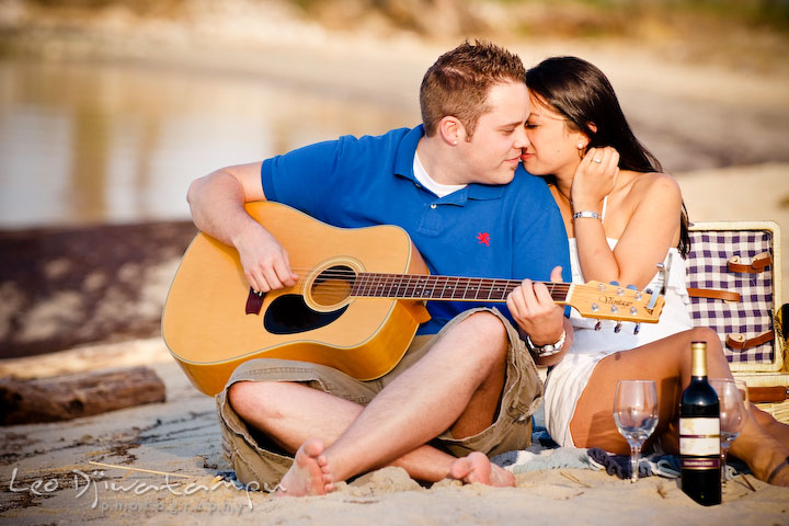 engaged couple, two hearts in love. Romantic engagement session on beach Kent Island Maryland