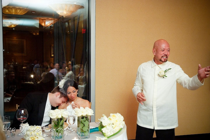 Father of the bride's speech. Bride and groom listening. Falls Church Virginia 2941 Restaurant Wedding Photographer