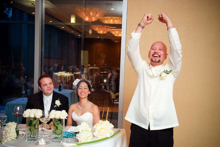 Spirited father of the bride smiled and raised both fist in the air during speech. Falls Church Virginia 2941 Restaurant Wedding Photographer