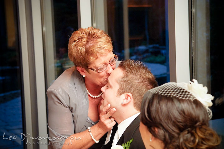 Mother of groom kissed her son after the speech. Falls Church Virginia 2941 Restaurant Wedding Photographer