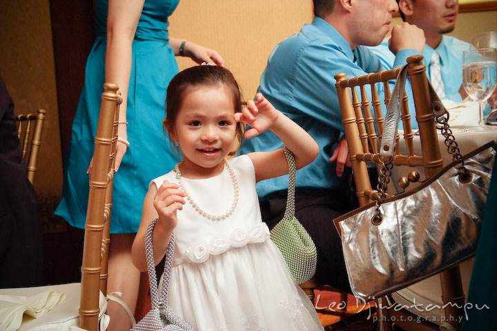 Flower girl grab two lady purses. Falls Church Virginia 2941 Restaurant Wedding Photographer