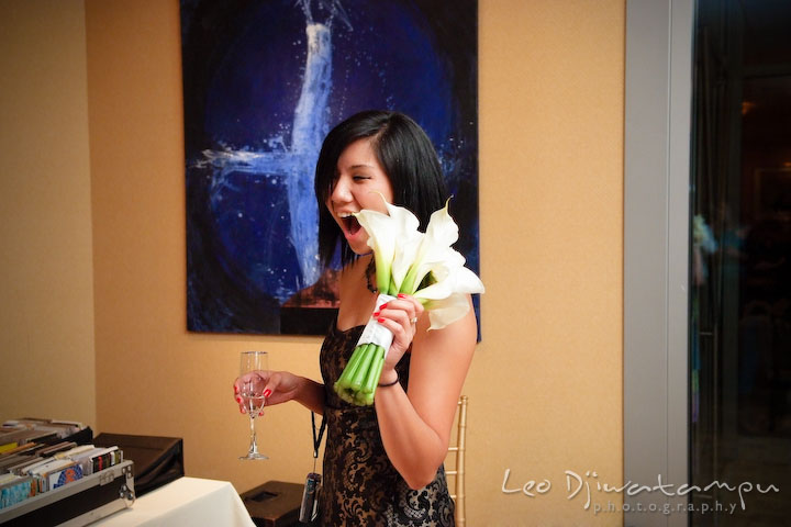 Guest girl who got the bouquet. Falls Church Virginia 2941 Restaurant Wedding Photographer