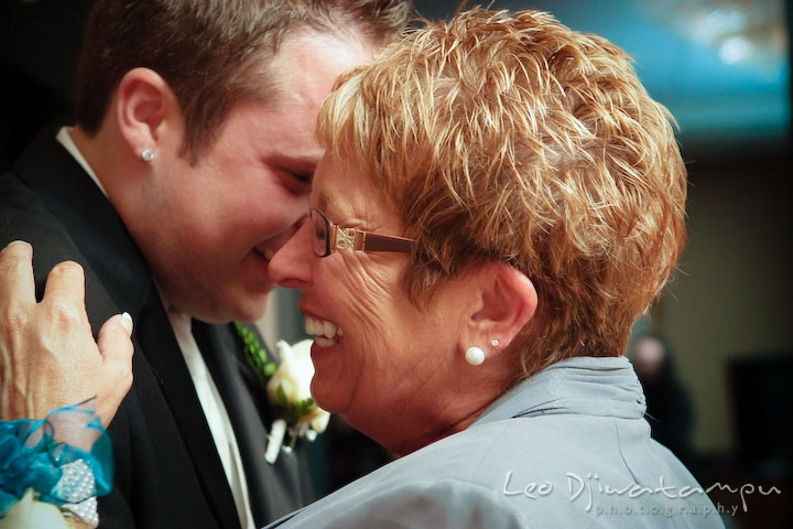 Mother of groom and son dance. Groom and mother laughing. Falls Church Virginia 2941 Restaurant Wedding Photographer