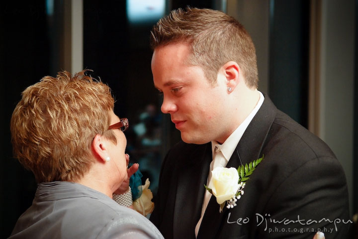 Groom looked at mother with much love during dance. Falls Church Virginia 2941 Restaurant Wedding Photographer