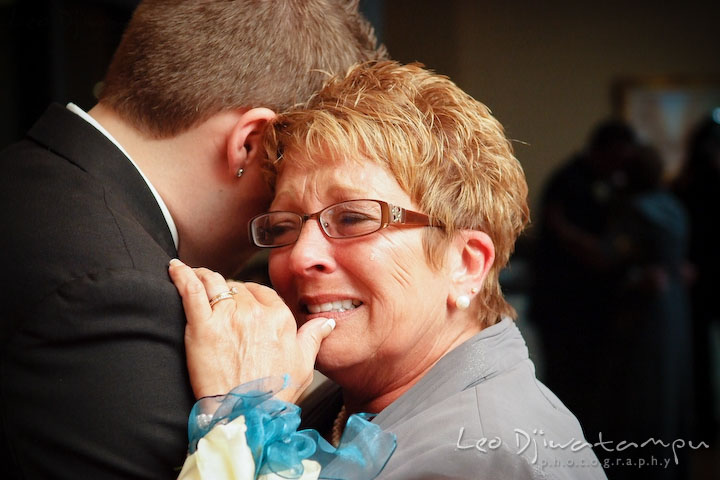 Mother of groom getting emotional, sheds tear when dancing with her son. Falls Church Virginia 2941 Restaurant Wedding Photographer