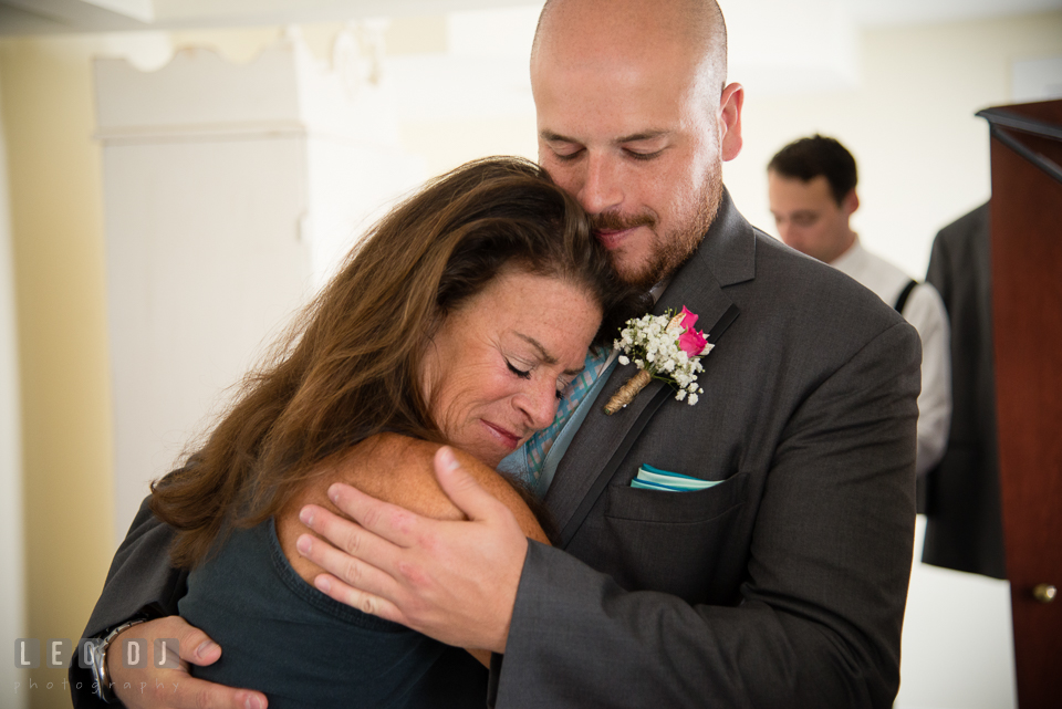 The Oaks Waterfront Inn Mother of Groom hugging son with love photo by Leo Dj Photography