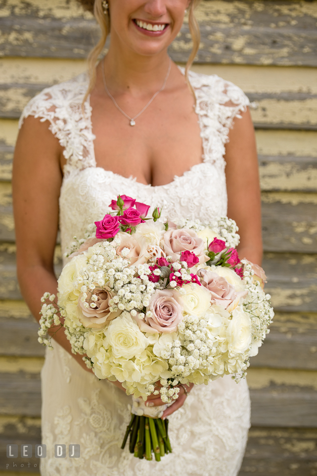 The Oaks Waterfront Inn Bride beautiful large flower bouquet by florist Seasonal Flowers photo by Leo Dj Photography