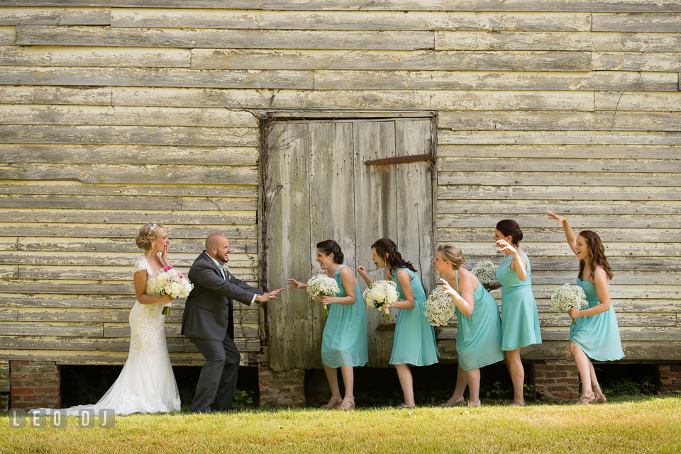 The Oaks Waterfront Inn Bride, Groom, and Bridesmaids doing silly poses photo by Leo Dj Photography