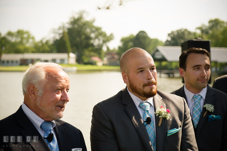 The Oaks Waterfront Inn Groom almost cried seeing Bride walking down the aisle photo by Leo Dj Photography