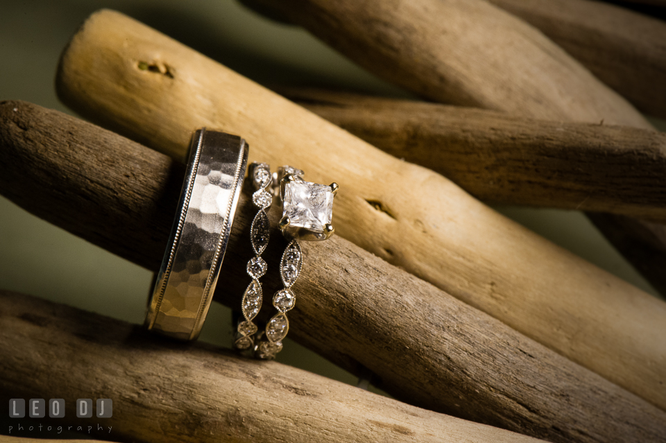 The Oaks Waterfront Inn close up shot of Bride and Groom's engagement ring and wedding bands photo by Leo Dj Photography