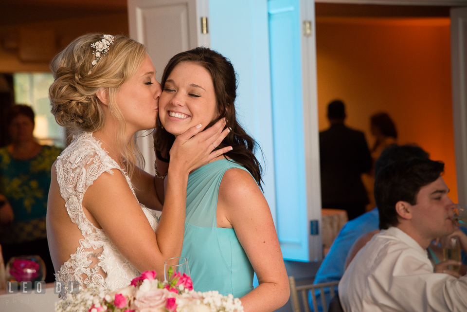 The Oaks Waterfront Inn Bride hugged and kissed Maid of Honor after her toast speech photo by Leo Dj Photography