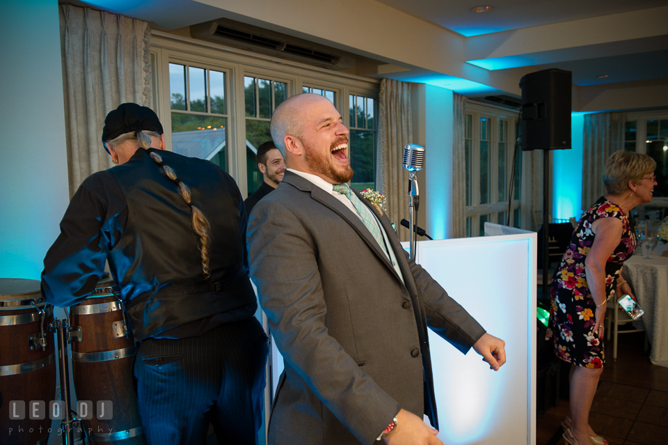 The Oaks Waterfront Inn Groom laughing seeing Darth Vader impersonator entering ballroom photo by Leo Dj Photography