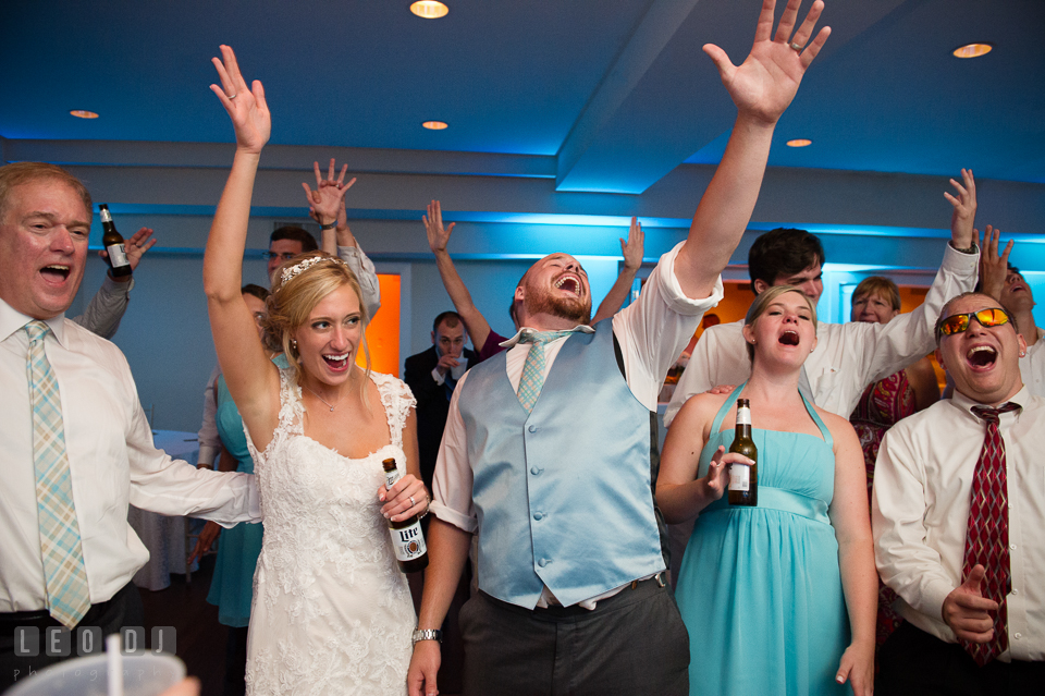 The Oaks Waterfront Inn Bride, Groom, family and guests singing Don't Stop Believin' from Journey photo by Leo Dj Photography