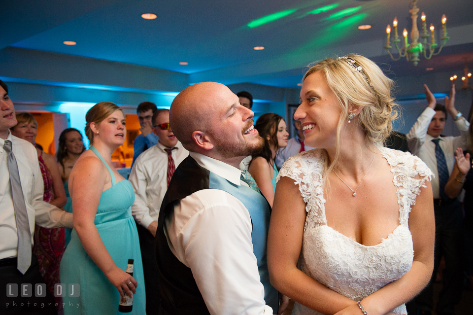 The Oaks Waterfront Inn Bride and Groom singing and dancing together photo by Leo Dj Photography