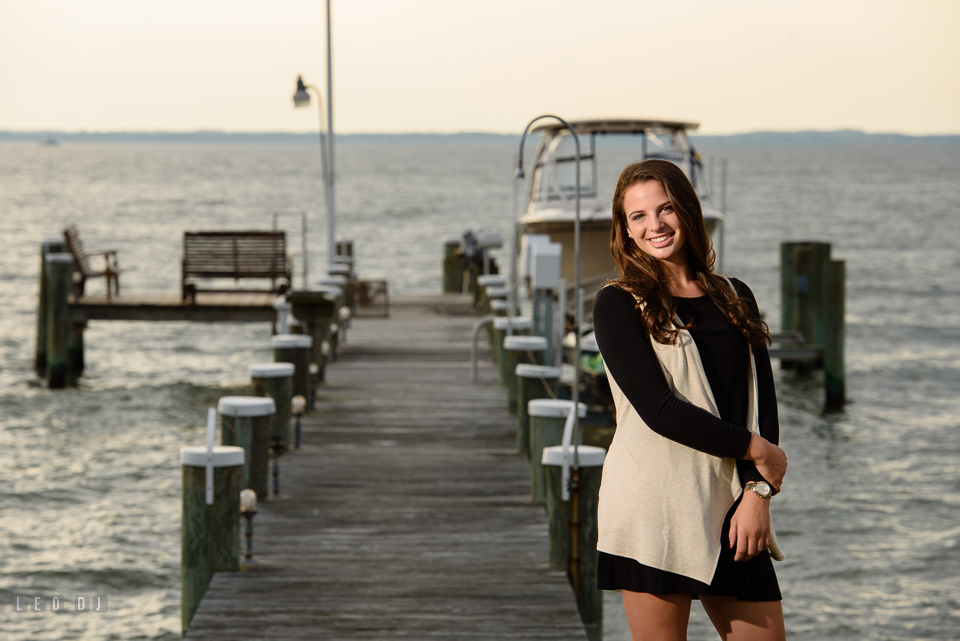 McDonogh High School Maryland senior beautiful girl posing by a boat pier at Chesapeake Bay photo by Leo Dj Photography.