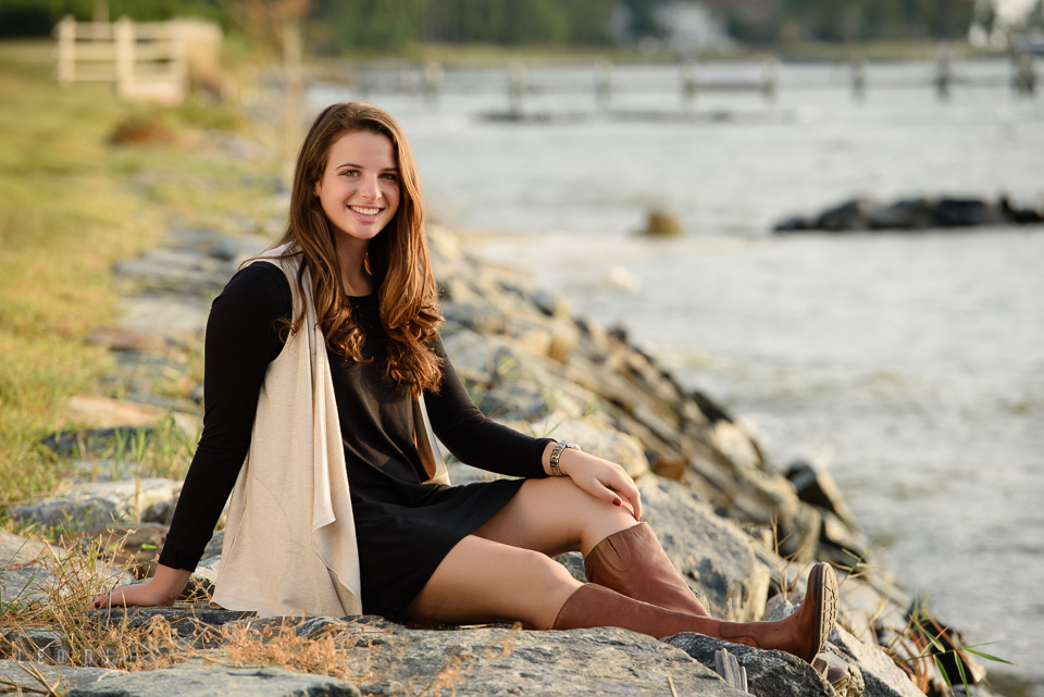 McDonogh High School Maryland senior beautiful girl posing on rocks at Chesapeake Bay photo by Leo Dj Photography.