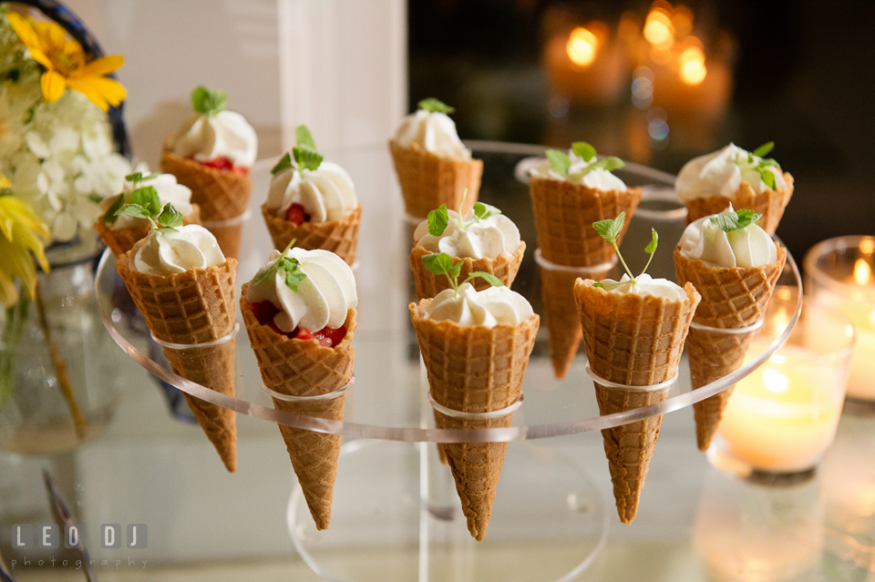 Assortment of desserts, cutely arranged using ice cream cones. Kent Island Maryland Chesapeake Bay Beach Club wedding photo, by wedding photographers of Leo Dj Photography. http://leodjphoto.com