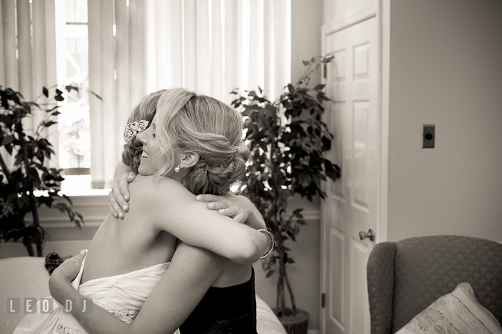 Sister in law hugging Bride. St Andrews United Methodist wedding photos at Annapolis, Eastern Shore, Maryland by photographers of Leo Dj Photography.