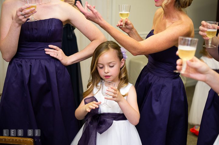 The ladies having a toast for the Bride before the ceremony. St Andrews United Methodist wedding photos at Annapolis, Eastern Shore, Maryland by photographers of Leo Dj Photography.