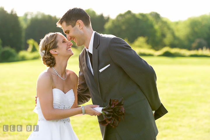 Bride and Groom laughing together. St Andrews United Methodist wedding photos at Annapolis, Eastern Shore, Maryland by photographers of Leo Dj Photography.