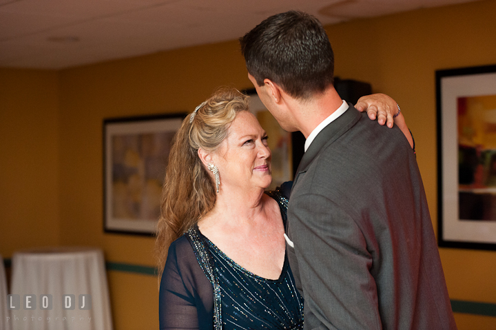 Mother of the Groom and son dance. Yellowfin Restaurant wedding reception photos at Annapolis, Eastern Shore, Maryland by photographers of Leo Dj Photography.