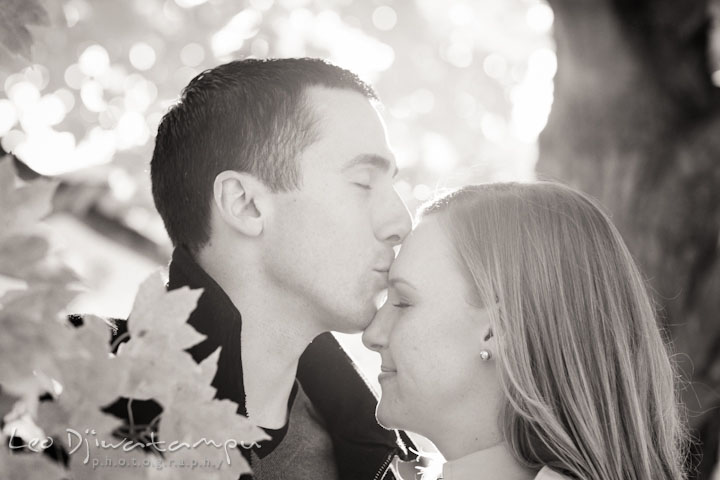 Engaged guy kissed his fiancée on her forehead. Chestertown Maryland and Washington College Pre-Wedding Engagement Session Photographer, Leo Dj Photography