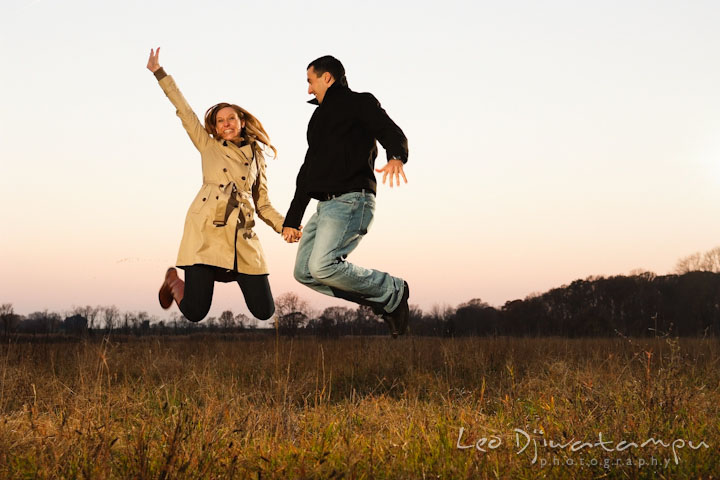 Engaged guy and girl jumping high up in the air. Chestertown Maryland and Washington College Pre-Wedding Engagement Session Photographer, Leo Dj Photography