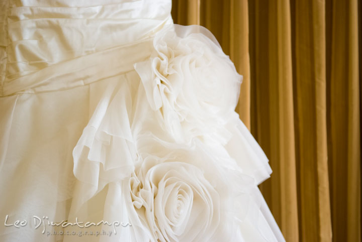 Wedding dress flower details. The Tidewater Inn Wedding, Easton Maryland, getting ready photo coverage of Kelsey and Jonnie by wedding photographers of Leo Dj Photography.