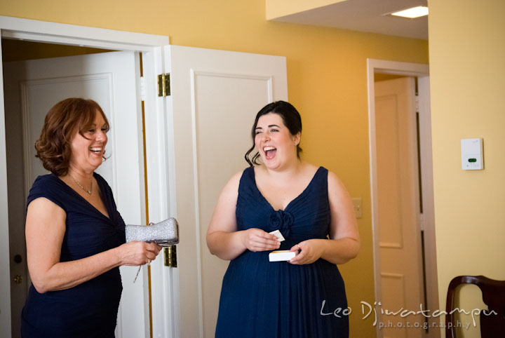 Mother of the bride and maid of honor laughing. The Tidewater Inn Wedding, Easton Maryland, getting ready photo coverage of Kelsey and Jonnie by wedding photographers of Leo Dj Photography.