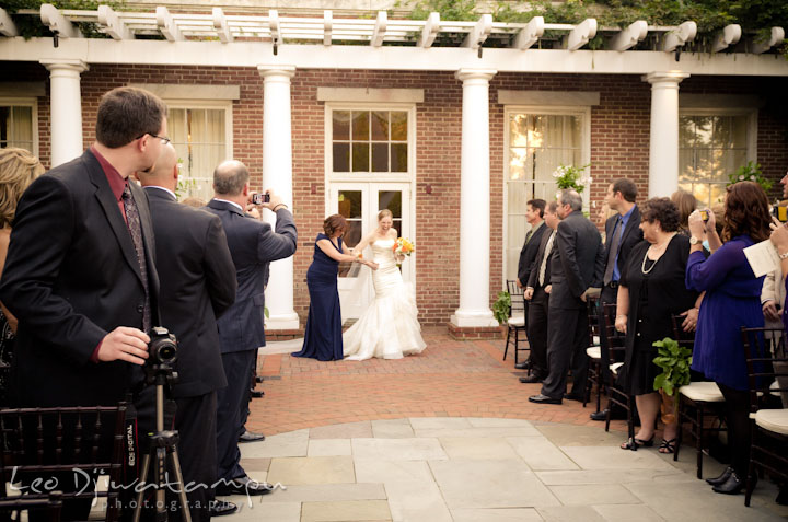 Bride escorted by mother during procession. The Tidewater Inn Wedding, Easton Maryland, ceremony photo coverage of Kelsey and Jonnie by wedding photographers of Leo Dj Photography.. The Tidewater Inn Wedding, Easton Maryland, ceremony photo coverage of Kelsey and Jonnie by wedding photographers of Leo Dj Photography.