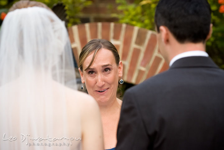 Matron of honor reading letter to bride and groom. The Tidewater Inn Wedding, Easton Maryland, ceremony photo coverage of Kelsey and Jonnie by wedding photographers of Leo Dj Photography.