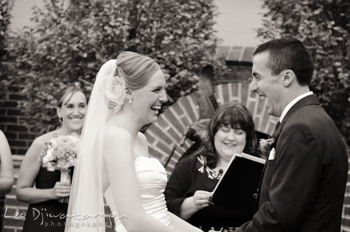 Bride and groom laughing together. The Tidewater Inn Wedding, Easton Maryland, ceremony photo coverage of Kelsey and Jonnie by wedding photographers of Leo Dj Photography.