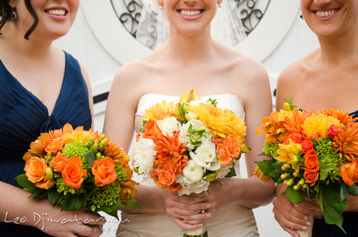 Bride and maids of honor holding flower bouquets. The Tidewater Inn Wedding, Easton Maryland, ceremony photo coverage of Kelsey and Jonnie by wedding photographers of Leo Dj Photography.