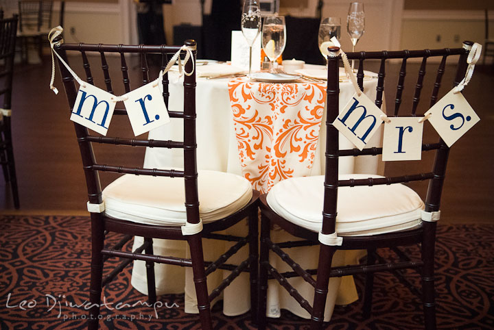 Mr and Mrs chair paper decoration, sweetheart table. The Tidewater Inn Wedding, Easton Maryland, reception photo coverage of Kelsey and Jonnie by wedding photographers of Leo Dj Photography.