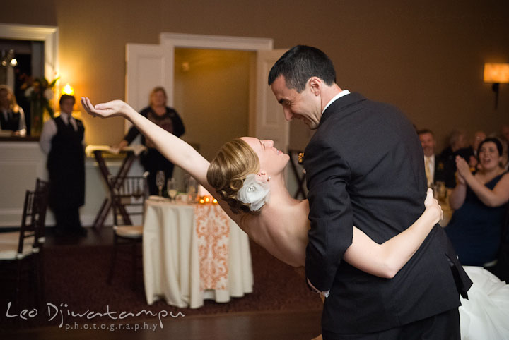 Bride and groom doing the dip during first dance. The Tidewater Inn Wedding, Easton Maryland, reception photo coverage of Kelsey and Jonnie by wedding photographers of Leo Dj Photography.