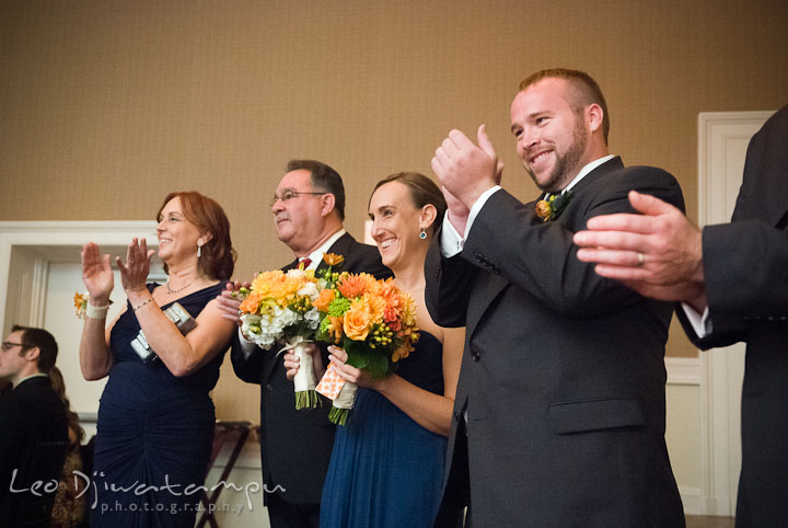 Wedding party and family applaused. The Tidewater Inn Wedding, Easton Maryland, reception photo coverage of Kelsey and Jonnie by wedding photographers of Leo Dj Photography.