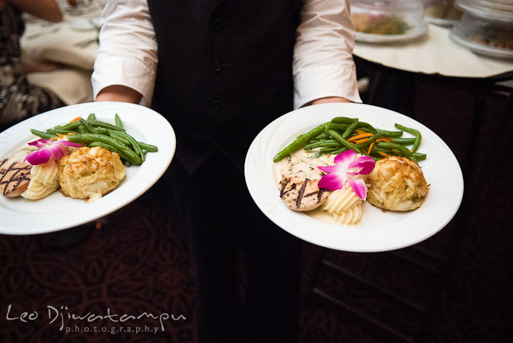 Dinner plate served with crab cake and grilled chicken. The Tidewater Inn Wedding, Easton Maryland, reception photo coverage of Kelsey and Jonnie by wedding photographers of Leo Dj Photography.