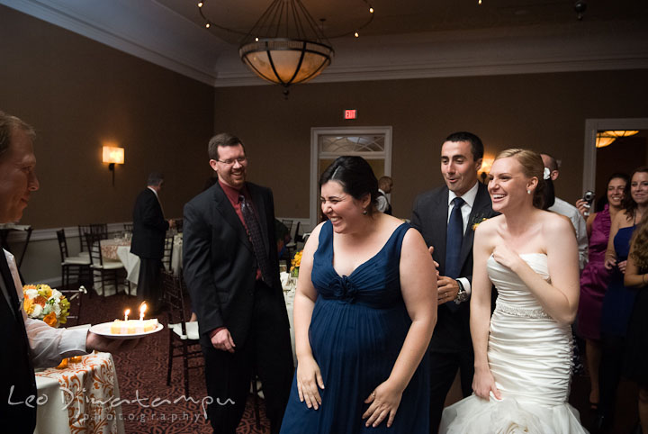 Birthday cake and candle for Maid of Honor's Birthday. The Tidewater Inn Wedding, Easton Maryland, reception photo coverage of Kelsey and Jonnie by wedding photographers of Leo Dj Photography.