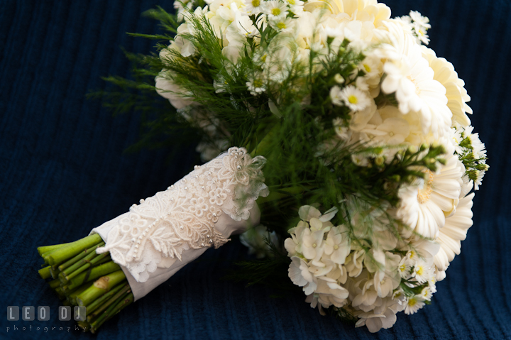 Bride's white flower bouquet by Monteray Farms. Riverhouse Pavilion wedding photos at Easton, Eastern Shore, Maryland by photographers of Leo Dj Photography. http://leodjphoto.com