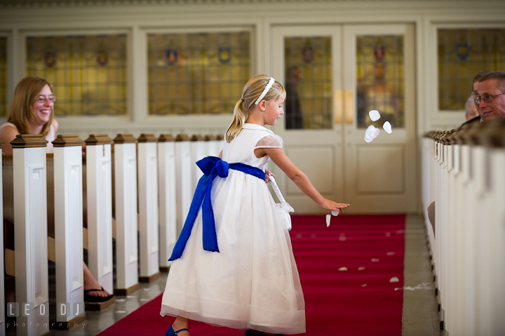 Flower girl spreading flower petals. St. Mark United Methodist Church wedding photos at Easton, Eastern Shore, Maryland by photographers of Leo Dj Photography. http://leodjphoto.com