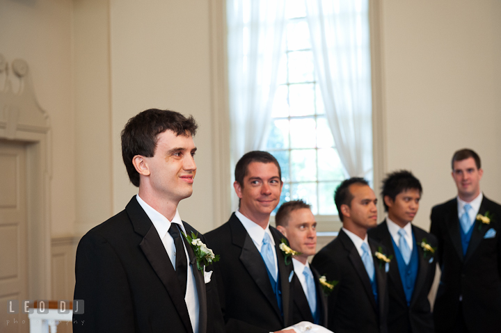 Groom smiling and happy to see Bride in her dress for the first time. St. Mark United Methodist Church wedding photos at Easton, Eastern Shore, Maryland by photographers of Leo Dj Photography. http://leodjphoto.com