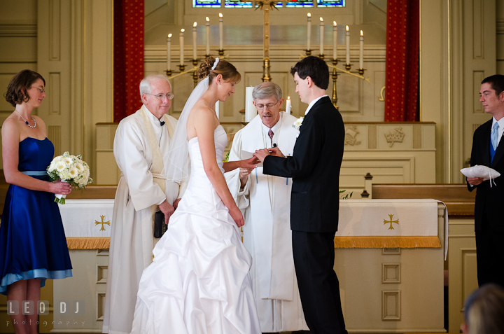 Exchanging of rings for the Bride and Groom. St. Mark United Methodist Church wedding photos at Easton, Eastern Shore, Maryland by photographers of Leo Dj Photography. http://leodjphoto.com