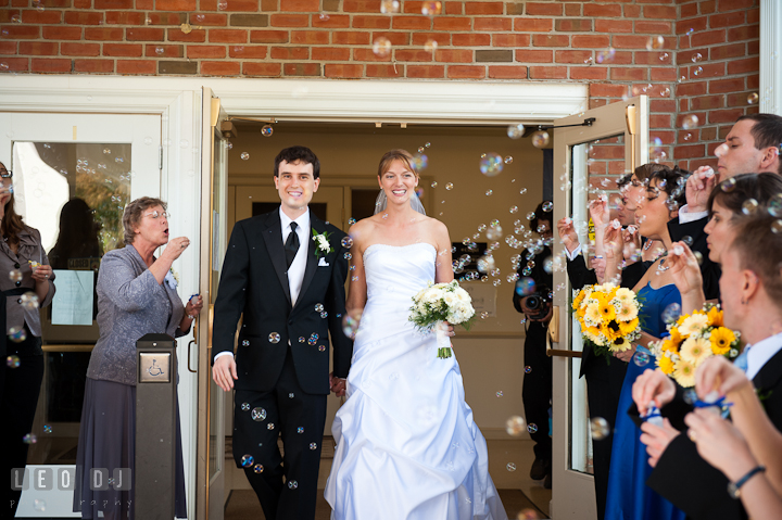 Bride and Groom exited the church and greeted with bubbles. St. Mark United Methodist Church wedding photos at Easton, Eastern Shore, Maryland by photographers of Leo Dj Photography. http://leodjphoto.com