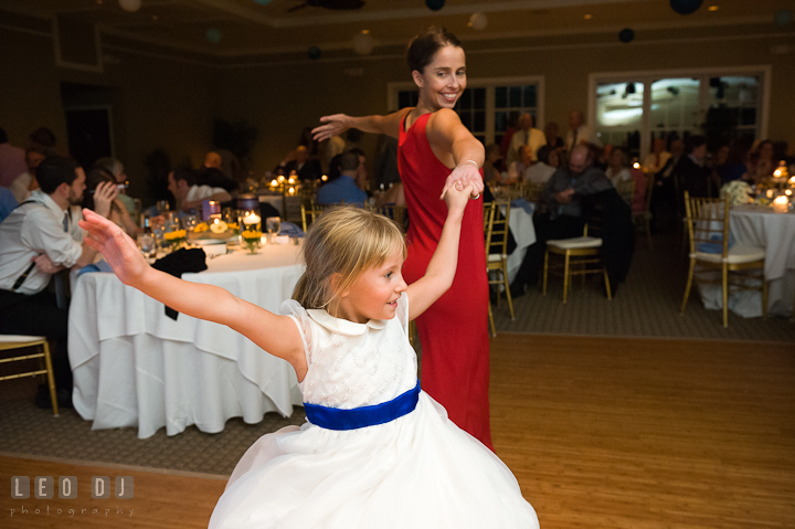 Flower girl dancing with her Mom. Riverhouse Pavilion wedding photos at Easton, Eastern Shore, Maryland by photographers of Leo Dj Photography. http://leodjphoto.com